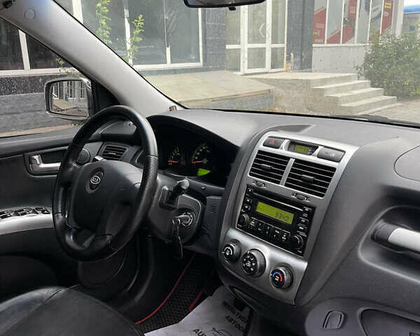 Зелений Кіа Sportage, об'ємом двигуна 1.98 л та пробігом 370 тис. км за 6500 $, фото 22 на Automoto.ua