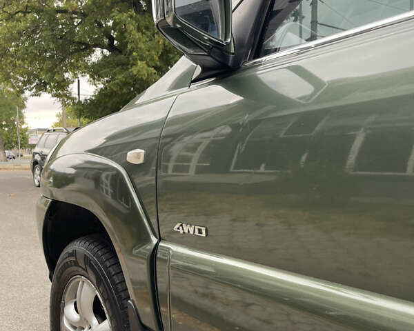 Зелений Кіа Sportage, об'ємом двигуна 1.98 л та пробігом 370 тис. км за 6500 $, фото 7 на Automoto.ua