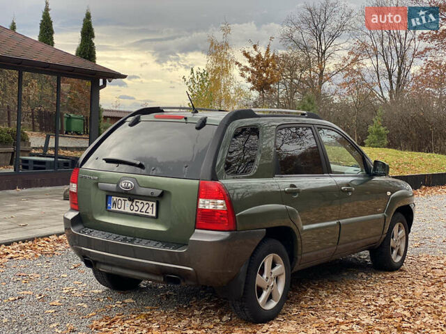 Зеленый Киа Sportage, объемом двигателя 2 л и пробегом 300 тыс. км за 3750 $, фото 17 на Automoto.ua