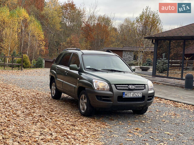 Зеленый Киа Sportage, объемом двигателя 2 л и пробегом 300 тыс. км за 3750 $, фото 5 на Automoto.ua