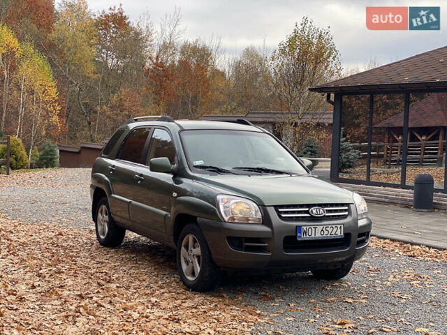 Зеленый Киа Sportage, объемом двигателя 2 л и пробегом 300 тыс. км за 3750 $, фото 7 на Automoto.ua