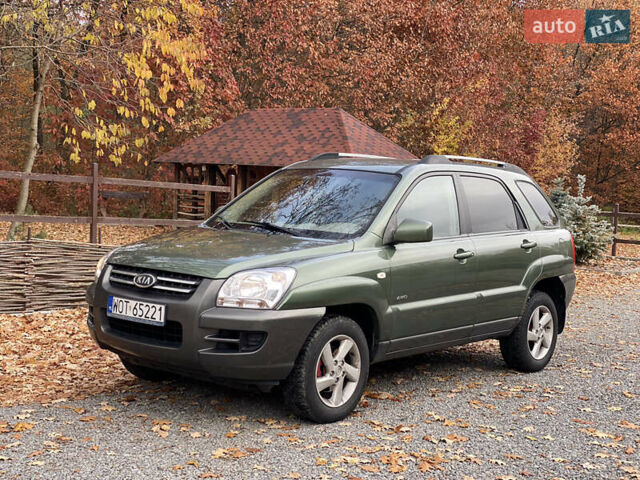 Зеленый Киа Sportage, объемом двигателя 2 л и пробегом 300 тыс. км за 3750 $, фото 1 на Automoto.ua