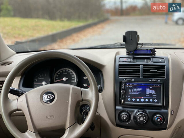 Зеленый Киа Sportage, объемом двигателя 2 л и пробегом 300 тыс. км за 3750 $, фото 23 на Automoto.ua