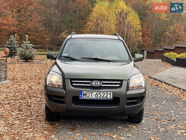 Зеленый Киа Sportage, объемом двигателя 2 л и пробегом 300 тыс. км за 3750 $, фото 10 на Automoto.ua