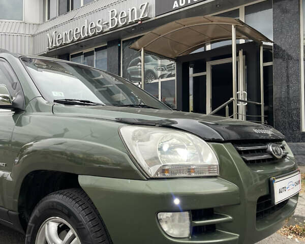 Зелений Кіа Sportage, об'ємом двигуна 1.98 л та пробігом 370 тис. км за 6500 $, фото 4 на Automoto.ua
