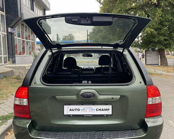 Зелений Кіа Sportage, об'ємом двигуна 1.98 л та пробігом 370 тис. км за 6500 $, фото 10 на Automoto.ua