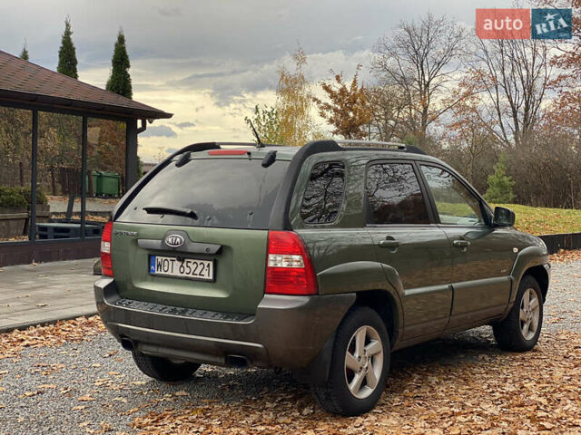 Зеленый Киа Sportage, объемом двигателя 2 л и пробегом 300 тыс. км за 3750 $, фото 15 на Automoto.ua