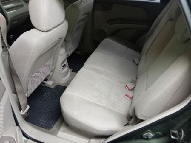 Зеленый Киа Sportage, объемом двигателя 2 л и пробегом 300 тыс. км за 4117 $, фото 6 на Automoto.ua