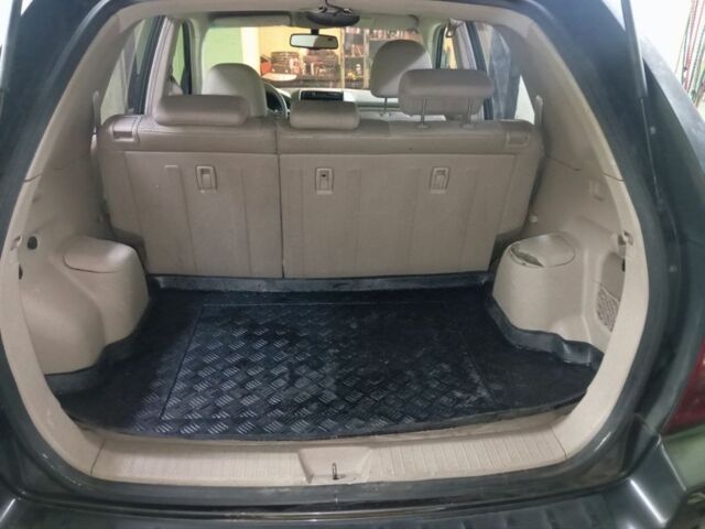 Зеленый Киа Sportage, объемом двигателя 2 л и пробегом 300 тыс. км за 4117 $, фото 7 на Automoto.ua