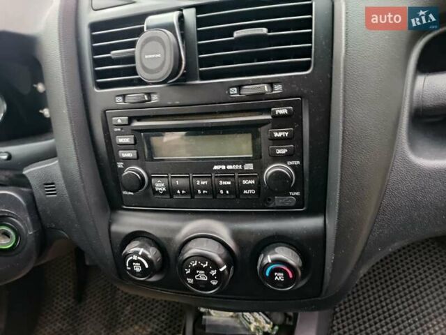 Зеленый Киа Sportage, объемом двигателя 2 л и пробегом 188 тыс. км за 7850 $, фото 11 на Automoto.ua