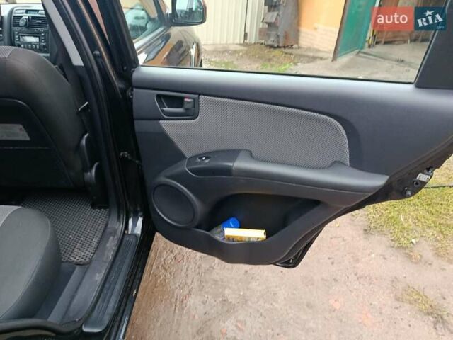 Зеленый Киа Sportage, объемом двигателя 2 л и пробегом 188 тыс. км за 7850 $, фото 10 на Automoto.ua