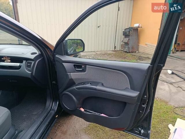 Зеленый Киа Sportage, объемом двигателя 2 л и пробегом 188 тыс. км за 7850 $, фото 12 на Automoto.ua