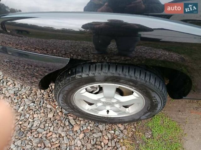 Зеленый Киа Sportage, объемом двигателя 2 л и пробегом 188 тыс. км за 7850 $, фото 8 на Automoto.ua