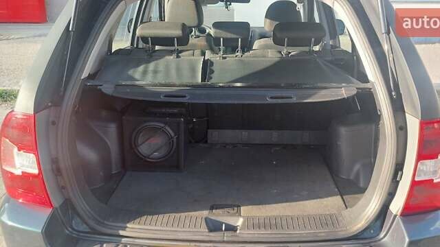 Зеленый Киа Sportage, объемом двигателя 1.98 л и пробегом 225 тыс. км за 8000 $, фото 3 на Automoto.ua