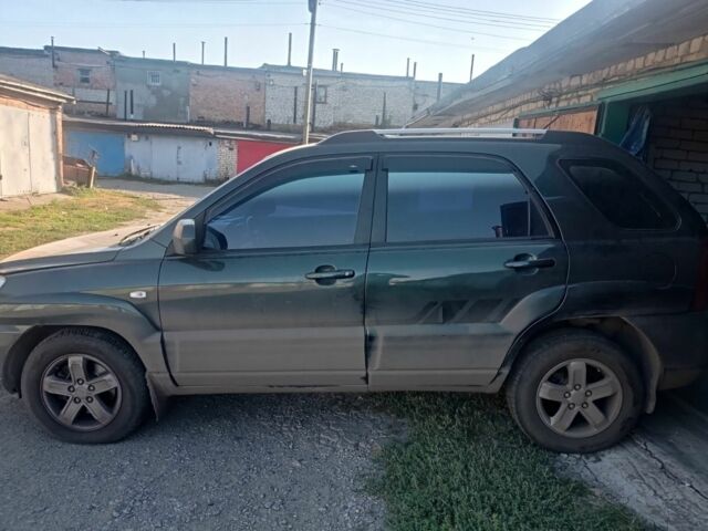 Зеленый Киа Sportage, объемом двигателя 2 л и пробегом 260 тыс. км за 6000 $, фото 1 на Automoto.ua