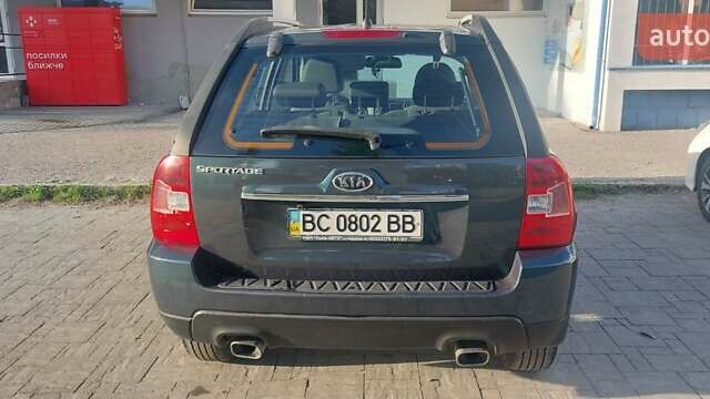 Зеленый Киа Sportage, объемом двигателя 1.98 л и пробегом 225 тыс. км за 8000 $, фото 2 на Automoto.ua
