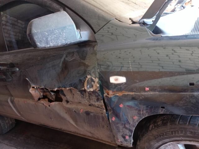 Зеленый Киа Sportage, объемом двигателя 2 л и пробегом 260 тыс. км за 6000 $, фото 7 на Automoto.ua