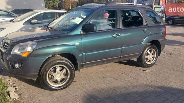 Зеленый Киа Sportage, объемом двигателя 1.98 л и пробегом 225 тыс. км за 8000 $, фото 1 на Automoto.ua