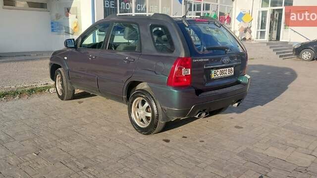 Зеленый Киа Sportage, объемом двигателя 1.98 л и пробегом 225 тыс. км за 8000 $, фото 11 на Automoto.ua
