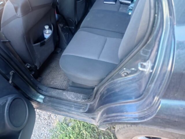 Зеленый Киа Sportage, объемом двигателя 2 л и пробегом 260 тыс. км за 6000 $, фото 5 на Automoto.ua