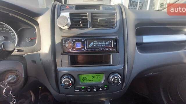 Зеленый Киа Sportage, объемом двигателя 1.98 л и пробегом 225 тыс. км за 8000 $, фото 19 на Automoto.ua