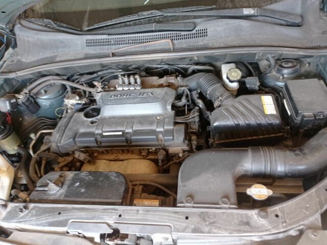 Зеленый Киа Sportage, объемом двигателя 2 л и пробегом 260 тыс. км за 6000 $, фото 8 на Automoto.ua