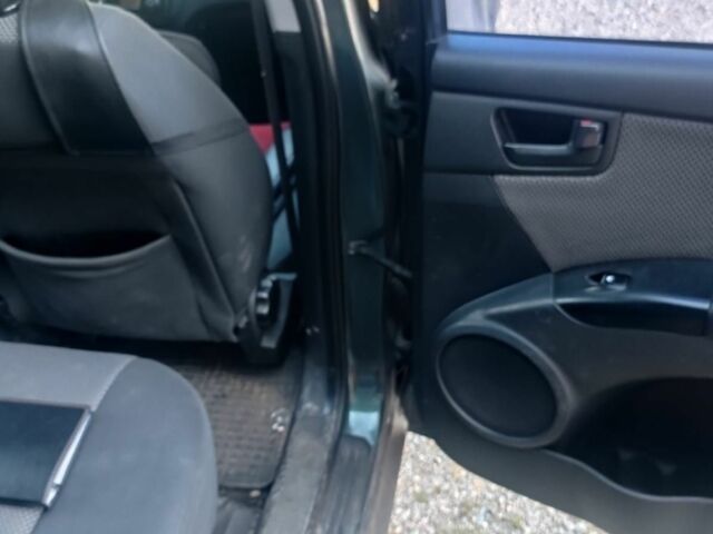 Зеленый Киа Sportage, объемом двигателя 2 л и пробегом 260 тыс. км за 6000 $, фото 3 на Automoto.ua