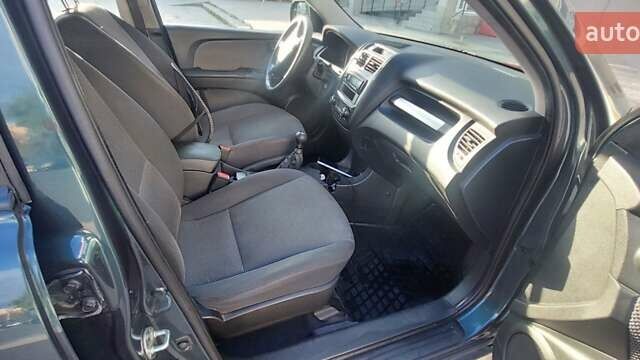 Зеленый Киа Sportage, объемом двигателя 1.98 л и пробегом 225 тыс. км за 8000 $, фото 15 на Automoto.ua