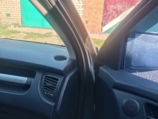 Зеленый Киа Sportage, объемом двигателя 2 л и пробегом 260 тыс. км за 6000 $, фото 4 на Automoto.ua