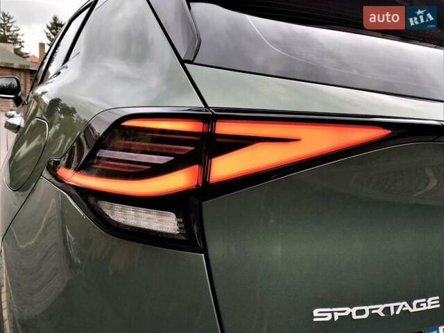 Зелений Кіа Sportage, об'ємом двигуна 2 л та пробігом 5 тис. км за 27800 $, фото 25 на Automoto.ua