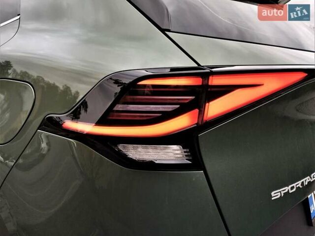 Зелений Кіа Sportage, об'ємом двигуна 2 л та пробігом 5 тис. км за 27800 $, фото 26 на Automoto.ua