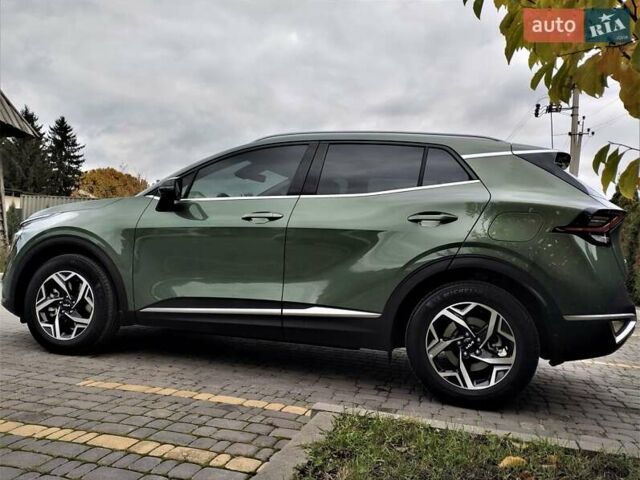 Зелений Кіа Sportage, об'ємом двигуна 2 л та пробігом 5 тис. км за 27800 $, фото 19 на Automoto.ua