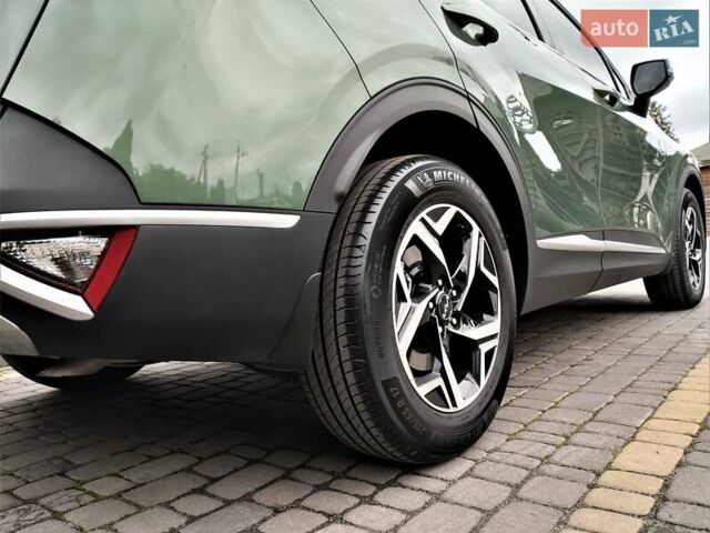 Зелений Кіа Sportage, об'ємом двигуна 2 л та пробігом 5 тис. км за 27800 $, фото 36 на Automoto.ua