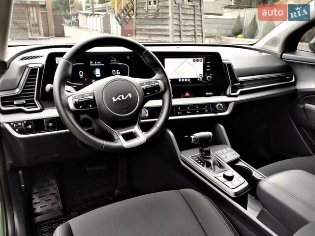 Зелений Кіа Sportage, об'ємом двигуна 2 л та пробігом 5 тис. км за 27800 $, фото 65 на Automoto.ua