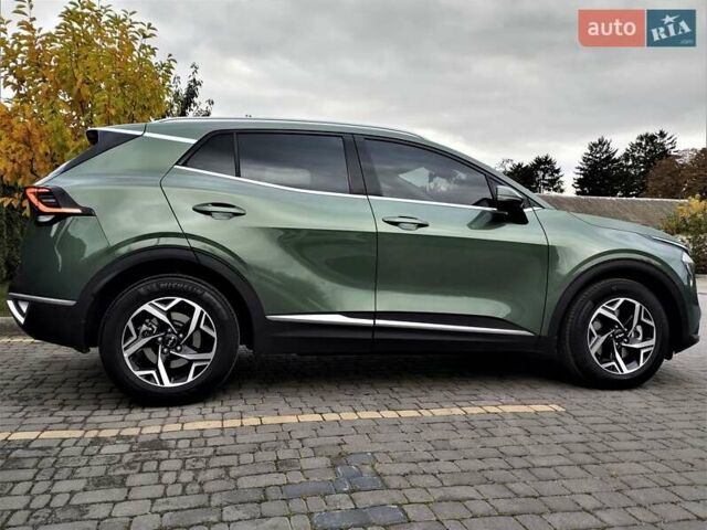 Зелений Кіа Sportage, об'ємом двигуна 2 л та пробігом 5 тис. км за 27800 $, фото 40 на Automoto.ua
