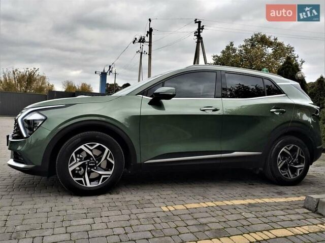 Зелений Кіа Sportage, об'ємом двигуна 2 л та пробігом 5 тис. км за 27800 $, фото 18 на Automoto.ua