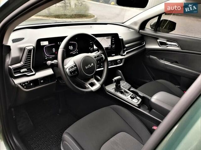 Зелений Кіа Sportage, об'ємом двигуна 2 л та пробігом 5 тис. км за 27800 $, фото 64 на Automoto.ua