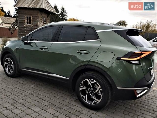 Зелений Кіа Sportage, об'ємом двигуна 2 л та пробігом 5 тис. км за 27800 $, фото 50 на Automoto.ua