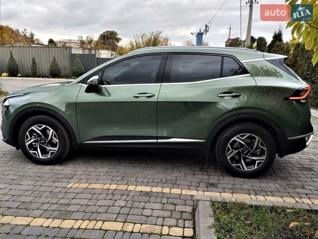 Зелений Кіа Sportage, об'ємом двигуна 2 л та пробігом 5 тис. км за 27800 $, фото 22 на Automoto.ua