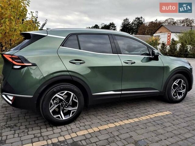 Зелений Кіа Sportage, об'ємом двигуна 2 л та пробігом 5 тис. км за 27800 $, фото 41 на Automoto.ua