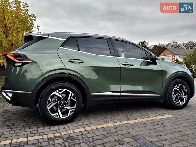 Зелений Кіа Sportage, об'ємом двигуна 2 л та пробігом 5 тис. км за 27800 $, фото 39 на Automoto.ua