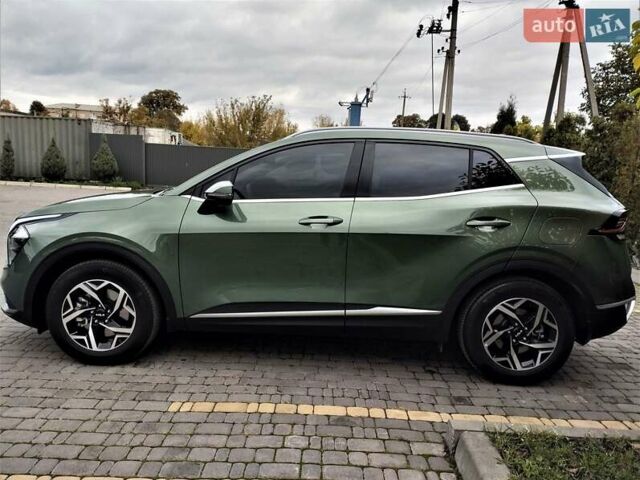 Зелений Кіа Sportage, об'ємом двигуна 2 л та пробігом 5 тис. км за 27800 $, фото 20 на Automoto.ua