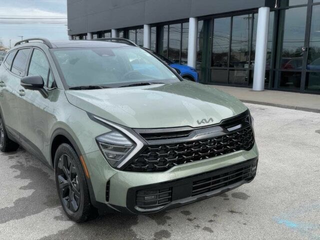 Зеленый Киа Sportage, объемом двигателя 1.6 л и пробегом 10 тыс. км за 10900 $, фото 2 на Automoto.ua