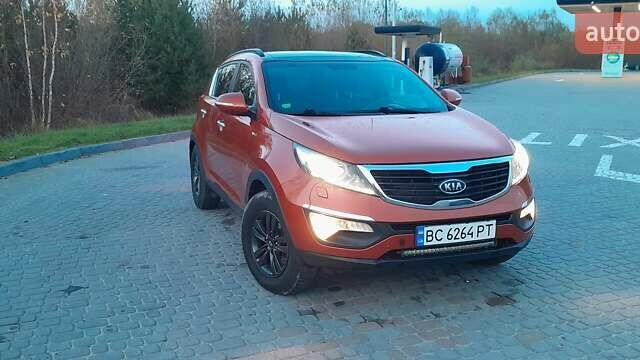 Оранжевый Киа Sportage, объемом двигателя 2 л и пробегом 282 тыс. км за 12900 $, фото 3 на Automoto.ua