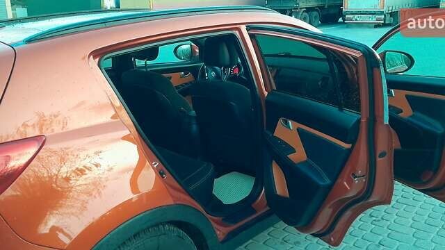 Оранжевый Киа Sportage, объемом двигателя 2 л и пробегом 282 тыс. км за 12900 $, фото 12 на Automoto.ua