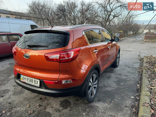 Помаранчевий Кіа Sportage, об'ємом двигуна 2 л та пробігом 101 тис. км за 13300 $, фото 6 на Automoto.ua