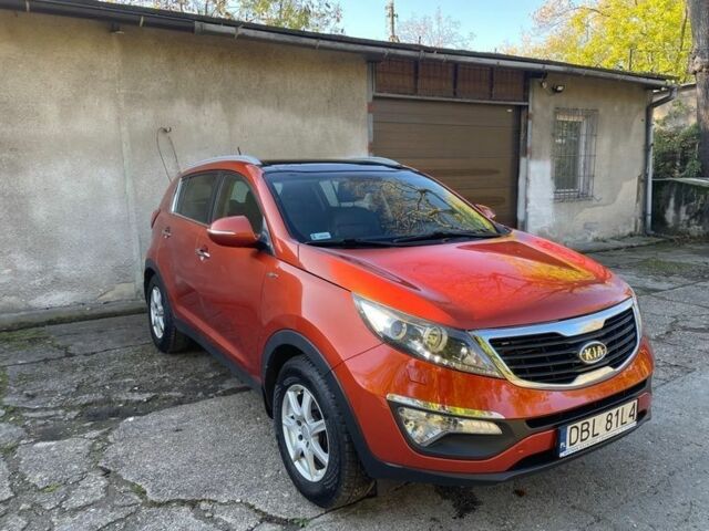 Оранжевый Киа Sportage, объемом двигателя 2 л и пробегом 150 тыс. км за 7900 $, фото 3 на Automoto.ua