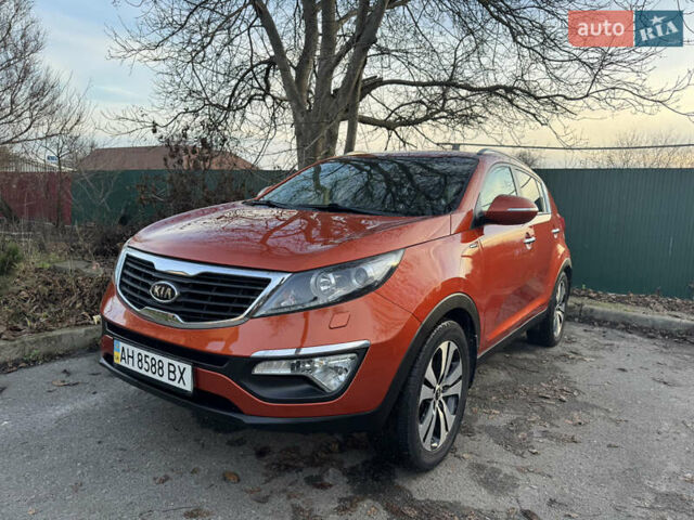 Помаранчевий Кіа Sportage, об'ємом двигуна 2 л та пробігом 101 тис. км за 13300 $, фото 1 на Automoto.ua