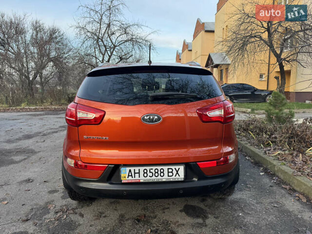 Помаранчевий Кіа Sportage, об'ємом двигуна 2 л та пробігом 101 тис. км за 13300 $, фото 5 на Automoto.ua