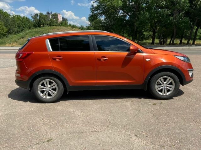 Оранжевый Киа Sportage, объемом двигателя 2 л и пробегом 142 тыс. км за 9500 $, фото 9 на Automoto.ua